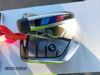 2021 BMW X6 sDrive40i z VIN 5UXCY4C06M9E16162, wystawiony jako IAAI lot #41279040 z przebiegiem 94 494 mil mil oraz . Historia ofert i sprzedaży dostępna na DreamBid. Obrazek 11.