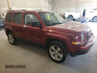 2014 Jeep Patriot Latitude with VIN 1C4NJRFB2ED734624, listed as a Copart auction lot 60675175 with 91,624 mi miles and Salvage title. Bid and sale history available at DreamBid. Image 4.
