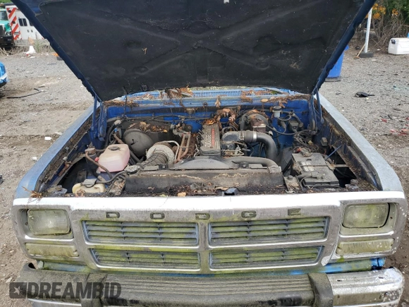 1991 Dodge D/W 250 z VIN 1B7KM26C5MS319916, wystawiony jako Copart lot #57512115 z przebiegiem 77 179 mil mil oraz Czysty tytuł • Clean title. Historia ofert i sprzedaży dostępna na DreamBid. Obrazek 11.