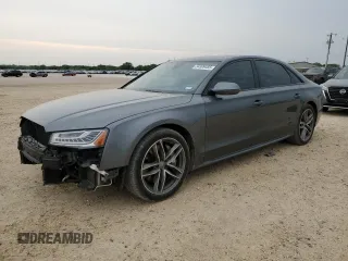 2017 Audi A8 z VIN WAU44AFD6HN017919, wystawiony jako Copart lot #54909485 z przebiegiem 70 253 mil mil oraz Szkody całkowita. Historia ofert i sprzedaży dostępna na DreamBid. Obrazek 1.