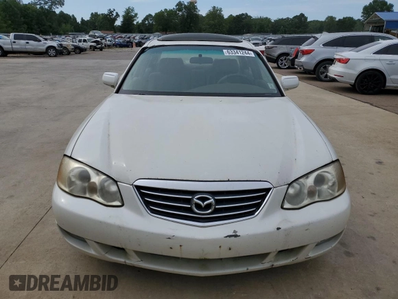 2001 Mazda Millenia z VIN JM1TA221911717066, wystawiony jako Copart lot #63341244 z przebiegiem 234 263 mil mil oraz Szkoda całkowita • Salvage title. Historia ofert i sprzedaży dostępna na DreamBid. Obrazek 5.