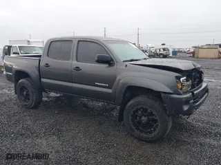 2011 Toyota Tacoma with VIN 3TMLU4EN8BM058550, listed as a IAAI auction lot 41219600 with 122,915 mi miles. Bid and sale history available at carsss.com. Image 1.