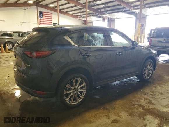 2020 Mazda CX-5 Grand Touring with VIN JM3KFBDM1L0860873, listed as a Copart auction lot 55463335 with 85,810 mi miles and Salvage Title. Bid and sale history available at DreamBid. Image 3.