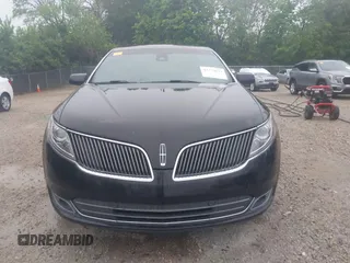 2013 Lincoln MKS EcoBoost with VIN 1LNHL9FT4DG607785, listed as a IAAI auction lot 42279833 with 126,548 mi miles and . Bid and sale history available at DreamBid. Image 12.