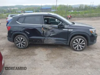 2023 Volkswagen Taos SE z VIN 3VVNX7B22PM330188, wystawiony jako IAAI lot #42219485 z przebiegiem 26 166 mil mil oraz . Historia ofert i sprzedaży dostępna na DreamBid. Obrazek 13.