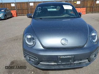 2018 Volkswagen Beetle SE with VIN 3VWJD7AT2JM710412, listed as a IAAI auction lot 41868455 with 1 mi miles. Bid and sale history available at carsss.com. Image 13.