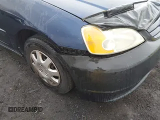 2003 Honda Civic LX with VIN 2HGES165X3H564619, listed as a IAAI auction lot 42017947 with 125,518 mi miles. Bid and sale history available at carsss.com. Image 13.