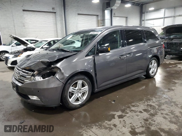 2013 Honda Odyssey Touring with VIN 5FNRL5H90DB071415, listed as a Copart auction lot 52697785 with 200,430 mi miles and Salvage Title. Bid and sale history available at carsss.com. Image 1.