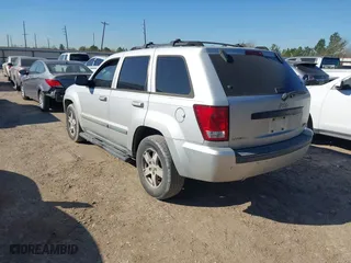 2007 Jeep Grand Cherokee Laredo with VIN 1J8HS48P77C595484, listed as a IAAI auction lot 41775290 with 176,751 mi miles. Bid and sale history available at carsss.com. Image 3.