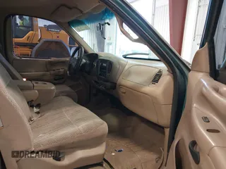 1997 Ford F-150 z VIN 1FTEF18L3VKC01590, wystawiony jako IAAI lot #41807198 z przebiegiem 210 000 mil mil oraz . Historia ofert i sprzedaży dostępna na DreamBid. Obrazek 5.