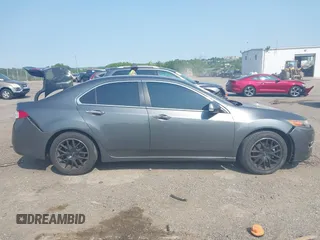 2009 Acura TSX z VIN JH4CU26609C033244, wystawiony jako IAAI lot #42400966 z przebiegiem 80 487 mil mil oraz . Historia ofert i sprzedaży dostępna na DreamBid. Obrazek 12.