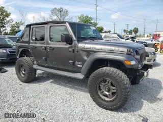 2018 Jeep Wrangler Unlimited Sport S with VIN 1C4HJXDG2JW147032, listed as a Copart auction lot 53462135 with 55,868 mi miles and Salvage Title. Bid and sale history available at carsss.com. Image 4.