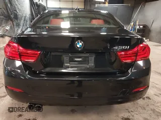 2019 BMW 4 Series 430i with VIN WBA4W3C52KAF93592, listed as a IAAI auction lot 41119481 with 104,214 mi miles and . Bid and sale history available at DreamBid. Image 16.