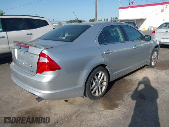 2012 Ford Fusion SEL with VIN 3FAHP0JG4CR415424, listed as a IAAI auction lot 42555115 with 94,276 mi miles and . Bid and sale history available at DreamBid. Image 4.