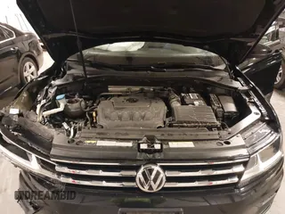 2021 Volkswagen Tiguan SE with VIN 3VV2B7AXXMM034880, listed as a IAAI auction lot 41979636 with 34,490 mi miles and . Bid and sale history available at DreamBid. Image 10.