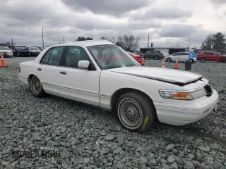 1997 Mercury Grand Marquis LS with VIN 2MELM75W7VX651074, listed as a Copart auction lot 44707425 with Not Provided miles and Salvage Title. Bid and sale history available at DreamBid. Image 4.