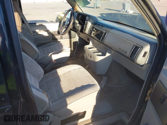 1991 Chevrolet Astro with VIN 1GNDM19Z2MB123653, listed as a IAAI auction lot 41388286 with 175,009 mi miles. Bid and sale history available at carsss.com. Image 5.