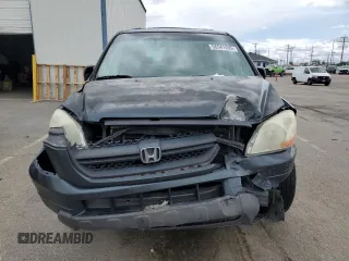 2003 Honda Pilot EX z VIN 2HKYF18563H543125, wystawiony jako Copart lot #56541455 z przebiegiem 241 804 mil mil oraz Szkoda całkowita • Salvage title. Historia ofert i sprzedaży dostępna na DreamBid. Obrazek 5.