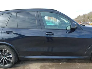 2022 BMW X5 xDrive40i z VIN 5UXCR6C0XN9J12212, wystawiony jako IAAI lot #41656748 z przebiegiem 30 740 mil mil oraz . Historia ofert i sprzedaży dostępna na DreamBid. Obrazek 13.