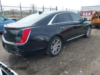 2018 Cadillac XTS Luxury with VIN 2G61M5S30J9145353, listed as a IAAI auction lot 41859404 with 137,874 mi miles. Bid and sale history available at carsss.com. Image 4.