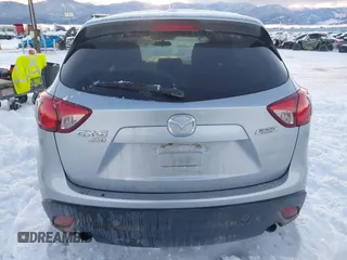 2016 Mazda CX-5 Touring with VIN JM3KE4CY9G0904000, listed as a IAAI auction lot 41186630 with 73,900 mi miles. Bid and sale history available at carsss.com. Image 16.