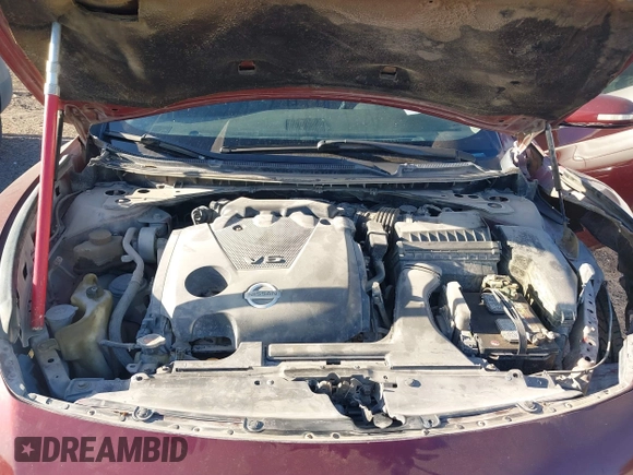 2013 Nissan Maxima S with VIN 1N4AA5AP7DC807233, listed as a IAAI auction lot 41760607 with 163,599 mi miles and . Bid and sale history available at DreamBid. Image 10.