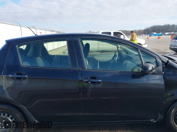 2014 Toyota Yaris L with VIN JTDKTUD36ED586456, listed as a IAAI auction lot 41888730 with 92,742 mi miles. Bid and sale history available at carsss.com. Image 13.