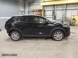 2019 Hyundai Tucson Value with VIN KM8J3CA43KU035220, listed as a IAAI auction lot 41500321 with 79,246 mi miles. Bid and sale history available at carsss.com. Image 14.