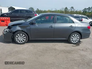 2013 Toyota Corolla L with VIN 2T1BU4EE7DC100830, listed as a IAAI auction lot 42032150 with 205,914 mi miles. Bid and sale history available at carsss.com. Image 14.