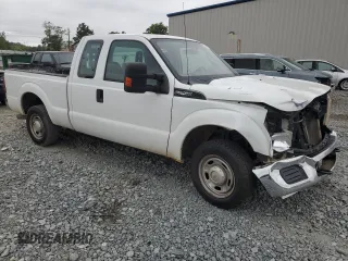 2014 Ford F-250 XLT with VIN 1FT7X2A65EEA98638, listed as a Copart auction lot 60948084 with 319,812 mi miles and Salvage title. Bid and sale history available at DreamBid. Image 4.