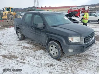 2011 Honda Ridgeline RT with VIN 5FPYK1F28BB451863, listed as a IAAI auction lot 41631755 with 316,707 mi miles. Bid and sale history available at carsss.com. Image 1.