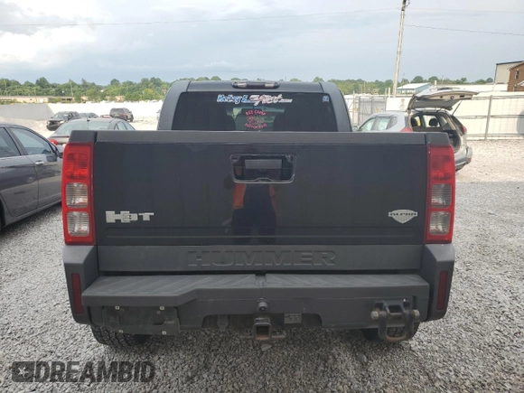2009 Hummer H3 with VIN 5GNEN13L198138745, listed as a Copart auction lot 63202914 with 168,076 mi miles and Salvage Title. Bid and sale history available at DreamBid. Image 6.