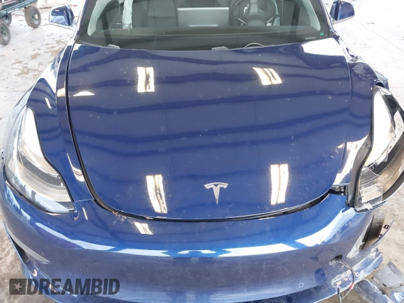 2018 Tesla Model 3 Long Range Battery z VIN 5YJ3E1EA7JF035949, wystawiony jako IAAI lot #41627027 z przebiegiem Nie podano mil oraz . Historia ofert i sprzedaży dostępna na DreamBid. Obrazek 10.