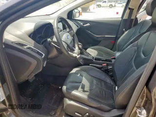 2017 Ford Focus Titanium with VIN 1FADP3J20HL253446, listed as a Copart auction lot 64196895 with 150,633 mi miles and Salvage title. Bid and sale history available at DreamBid. Image 7.