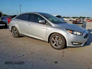2018 Ford Focus SE z VIN 1FADP3F2XJL277462, wystawiony jako Copart lot #60360985 z przebiegiem 81 831 mil mil oraz Czysty tytuł • Clean title. Historia ofert i sprzedaży dostępna na DreamBid. Obrazek 4.