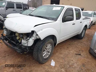 2016 Nissan Frontier S with VIN 1N6AD0ER8GN903359, listed as a IAAI auction lot 41097312 with 76,520 mi miles and . Bid and sale history available at DreamBid. Image 2.