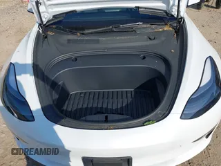 2023 Tesla Model 3 with VIN 5YJ3E1EA3PF617460, listed as a IAAI auction lot 42154401 with 9,578 mi miles and . Bid and sale history available at DreamBid. Image 10.