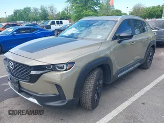 2023 Mazda CX-50 Meridian Edition z VIN 7MMVABXYXPN130990, wystawiony jako IAAI lot #42212027 z przebiegiem 49 015 mil mil oraz . Historia ofert i sprzedaży dostępna na DreamBid. Obrazek 2.