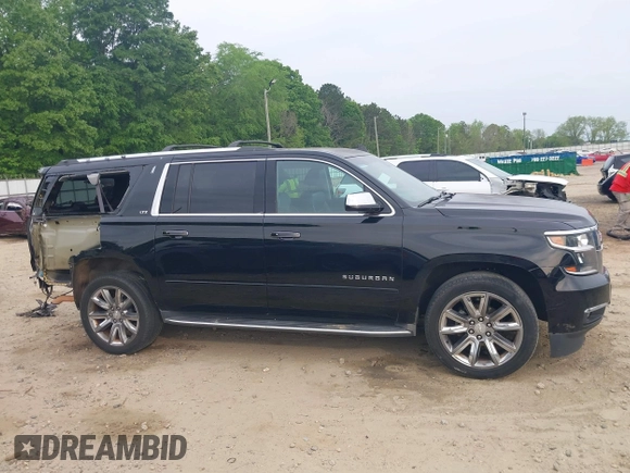 2015 Chevrolet Suburban LTZ with VIN 1GNSCKKCXFR731873, listed as a IAAI auction lot 42069917 with 108,963 mi miles and . Bid and sale history available at DreamBid. Image 14.