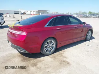 2016 Lincoln MKZ with VIN 3LN6L2GK2GR631195, listed as a IAAI auction lot 42001190 with 66,485 mi miles. Bid and sale history available at carsss.com. Image 4.