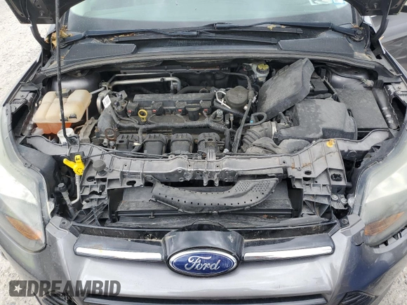 2014 Ford Focus Titanium with VIN 1FADP3N20EL329415, listed as a Copart auction lot 60881115 with 97,382 mi miles and Salvage title. Bid and sale history available at DreamBid. Image 11.