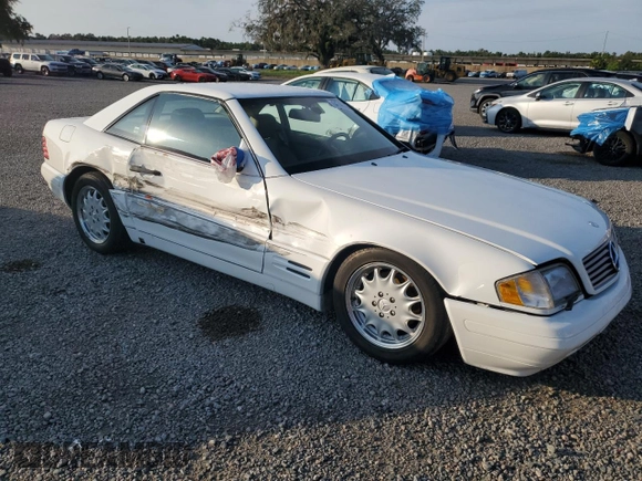 1997 Mercedes-Benz SL 500 with VIN WDBFA67FXVF149930, listed as a Copart auction lot 64749525 with 88,523 mi miles and Salvage title. Bid and sale history available at DreamBid. Image 4.