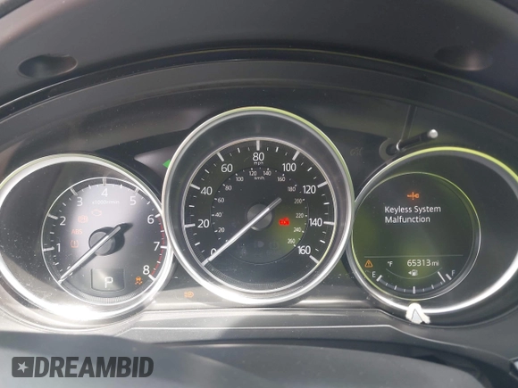2022 Mazda CX-9 Touring with VIN JM3TCBCY0N0608052, listed as a IAAI auction lot 42027465 with 65,313 mi miles and . Bid and sale history available at DreamBid. Image 7.