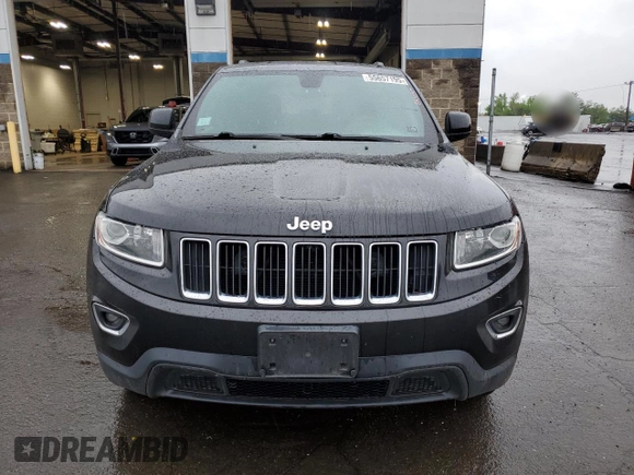 2014 Jeep Grand Cherokee Laredo with VIN 1C4RJFAG6EC371589, listed as a Copart auction lot 55657195 with 129,864 mi miles and Salvage Title. Bid and sale history available at DreamBid. Image 5.