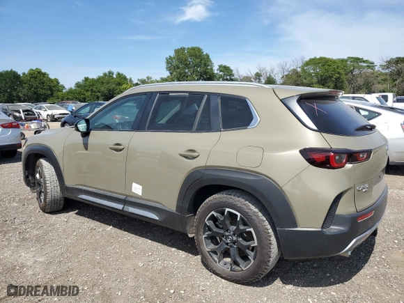 2023 Mazda CX-50 2.5 Turbo Meridian Edition with VIN 7MMVABXY8PN127764, listed as a Copart auction lot 68353004 with 24,209 mi miles and Salvage Title. Bid and sale history available at carsss.com. Image 2.
