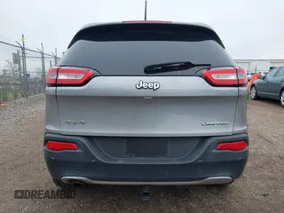 2014 Jeep Cherokee Limited z VIN 1C4PJMDB7EW197154, wystawiony jako IAAI lot #42079118 z przebiegiem 153 300 mil mil oraz . Historia ofert i sprzedaży dostępna na DreamBid. Obrazek 16.