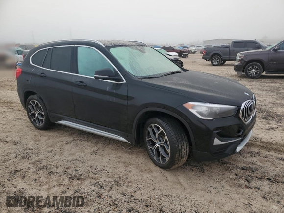 2021 BMW X1 xDrive28i with VIN WBXJG9C07M5T06155, listed as a Copart auction lot 84222754 with 18,466 mi miles and Salvage Title. Bid and sale history available at carsss.com. Image 4.