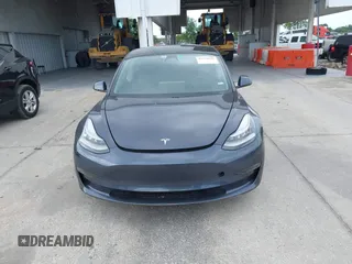 2021 Tesla Model 3 Long Range with VIN 5YJ3E1EB4MF855581, listed as a IAAI auction lot 41974515 with 71,561 mi miles. Bid and sale history available at carsss.com. Image 12.
