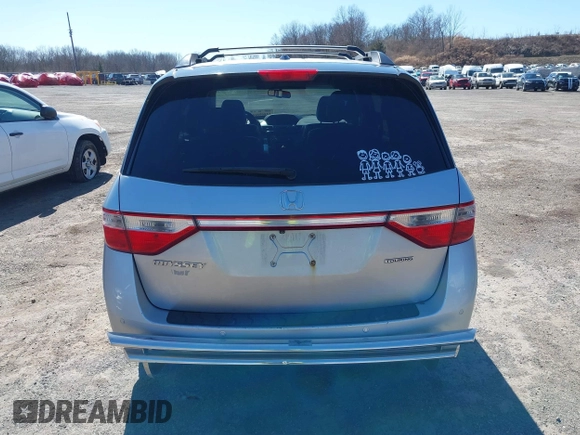 2012 Honda Odyssey Touring with VIN 5FNRL5H93CB042392, listed as a IAAI auction lot 41859533 with 169,141 mi miles. Bid and sale history available at carsss.com. Image 16.