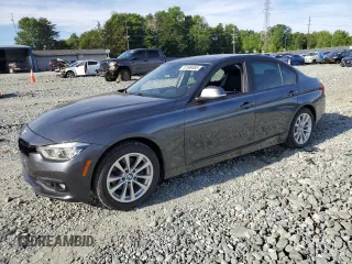 2018 BMW 3 Series 320i with VIN WBA8E1G56JNU89582, listed as a Copart auction lot 57589585 with 88,861 mi miles and Salvage title. Bid and sale history available at DreamBid. Image 1.